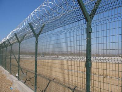 concertina wire installed on welded wire for security fence