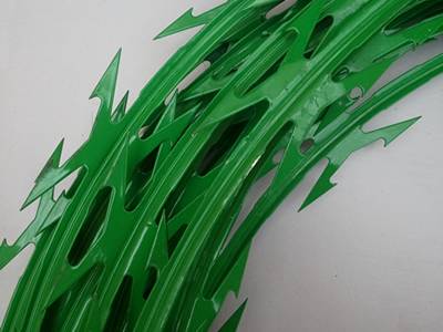 A part of PVC coated concertina razor wire in green.